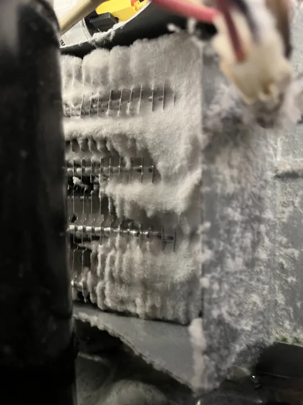Lint packed into dryer coils